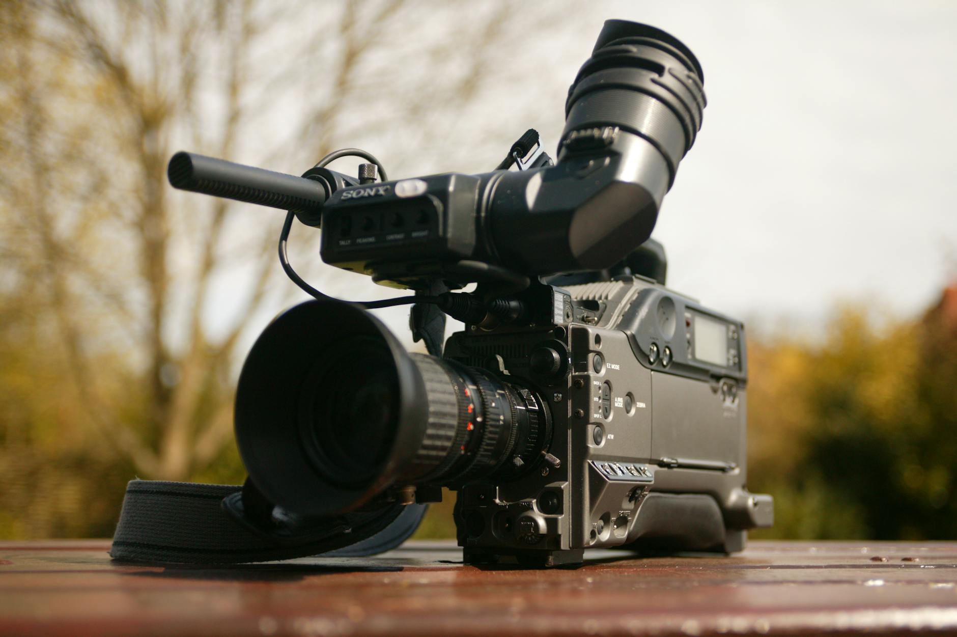 High-quality broadcast camera set outdoors, ideal for media and videography projects.